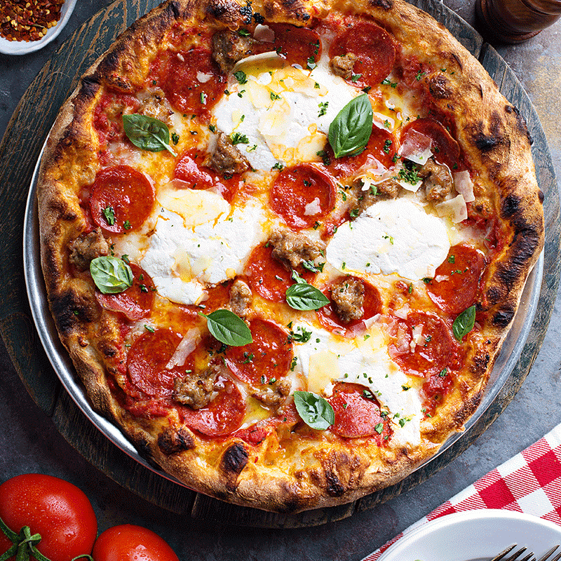 fresh baked pizza with cheese and pepperoni